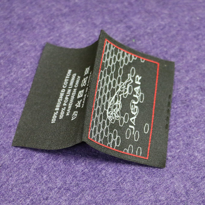 Les labels tissés plats à haute densité de tissu/ont personnalisé les labels tissés